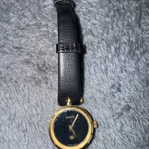 Gucci Black Dial Gold-Tone Round Leather Watch
